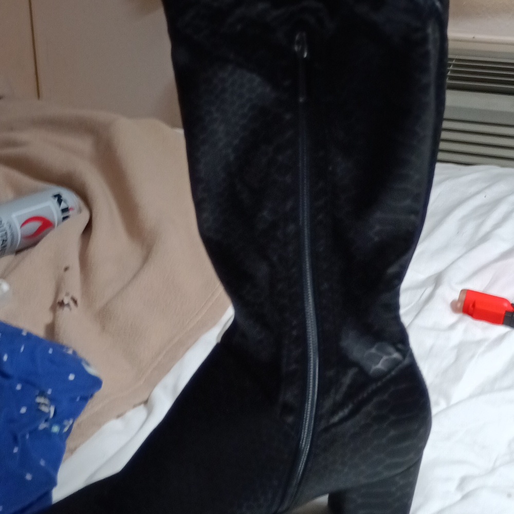 Women's thigh high black boots